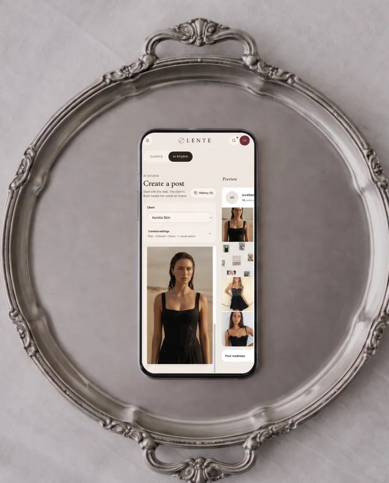 Lente AI Studio open on a phone resting on a silver tray